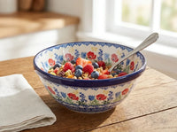 memory garden polish pottery cereal bowl with granola and berries on a wood kitchen counter