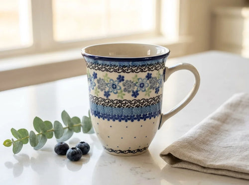 Polish pottery Eliza large coffee mug on marble kitchen counter by a sunny window