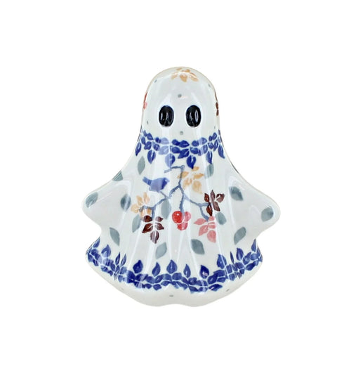 A ceramic ghost figurine with a white glaze, decorated with blue floral borders and small multicolored berries, on a solid white background.