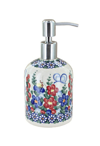 Product shot of Polish pottery soap dispenser in Garden Butterfly pattern