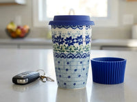 hallsey travel coffee mug on kitchen counter by pair of car keys