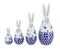 A set of four Daisy Dot Polish pottery bunny figurines