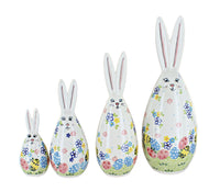 A set of four Polish pottery Petal Patch bunny figurines