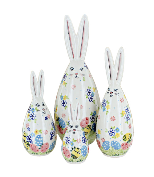 Staggered set of four Polish pottery Petal Patch bunny figurines