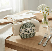 polish pottery ceramic sage floral napkin holder on wood breakfast table with linens and wildflowers