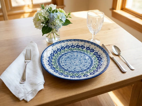 polish pottery hallsey plate by a sunny window in a kitchen